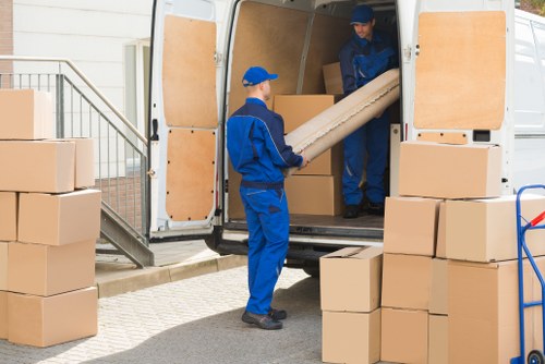 Removal van team planning a safe move in Kingston
