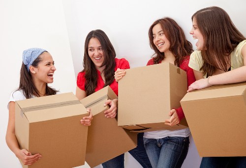 Removal team handling a flat move in Kingston with careful loading