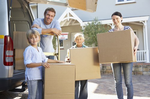 Van moving goods across Kingston near residential streets
