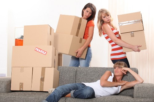 Local moving team handling household belongings in Kingston